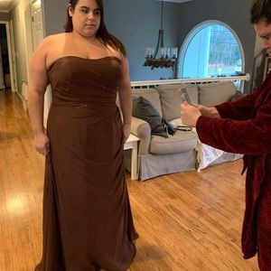 New brown gown. Comes with bolero jacket.